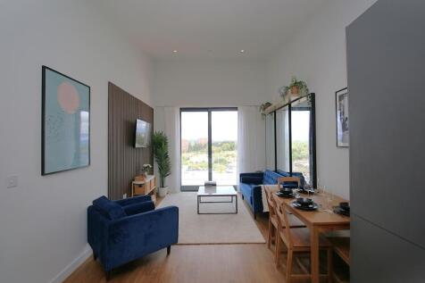 Located on the eighth floor, this impressive one-bedroom apartment enjoys floor-to-ceiling windows that maximise natural light while offering stunning views across the city and surrounding area. The a