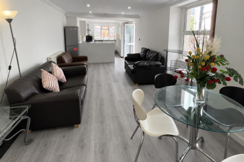 Contemporary Living Space with Grey Oak Flooring.p