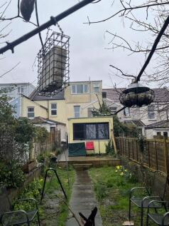 A spacious garden area with potential for relax...