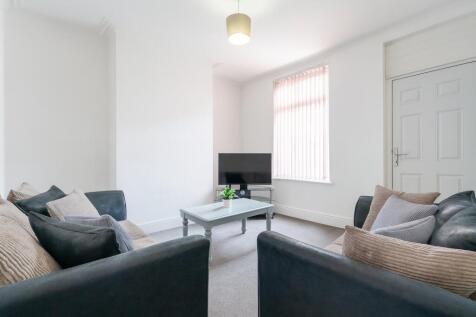 Bright and airy living room with comfy sofas...