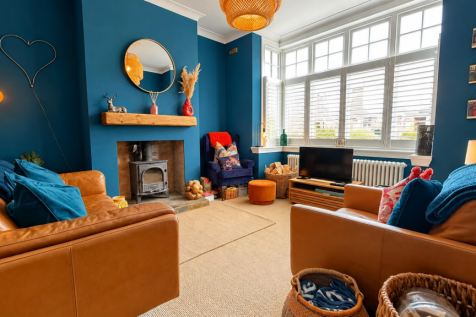 Teal Eclectic Living Room Retreat.png