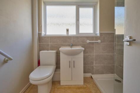 Refitted shower room to side