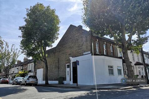 Front On Residential And Leafy Street