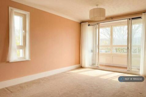Living Room With Sunroom