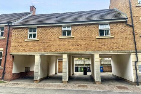 Modern brick exterior with ample parking space...
