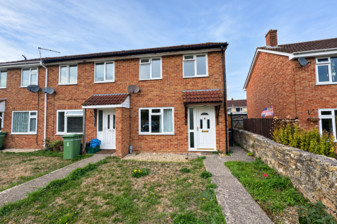Sunlit Brick Terraced Houses and Front Garden (1)