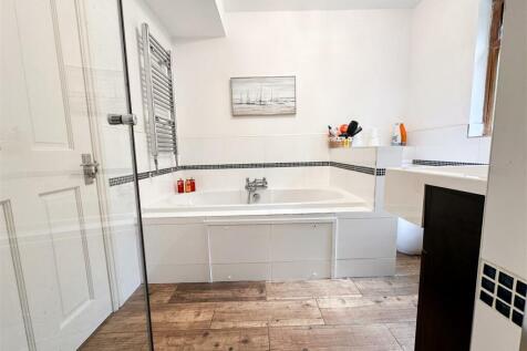 FAMILY BATH AND SHOWER ROOM