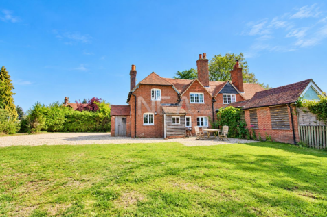 Rear of property with driveway