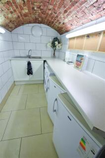 Unique vaulted utility room with ample workspac...