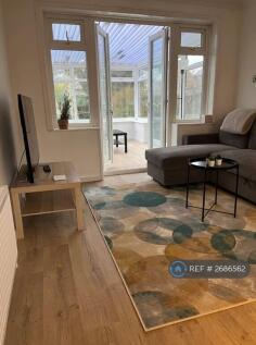 Living Room And Going Into Conservatory