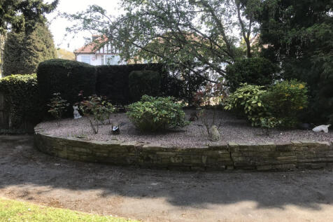 View of communal garden from lounge and bedroom