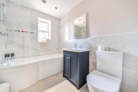 BATHROOM with shower over bath.jpg