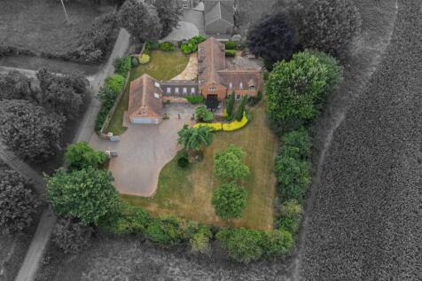 Beautifully private home with stunning landscaping