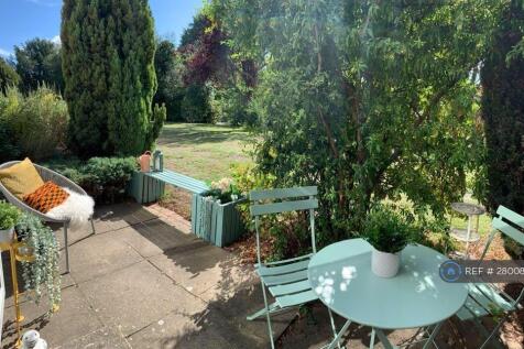 Patio And Communal Garden Beyond