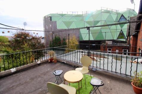 Private rooftop terrace with seating area, smal...