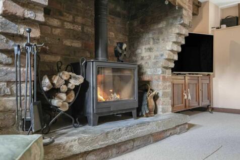 WOOD BURNER IN LOUNGE