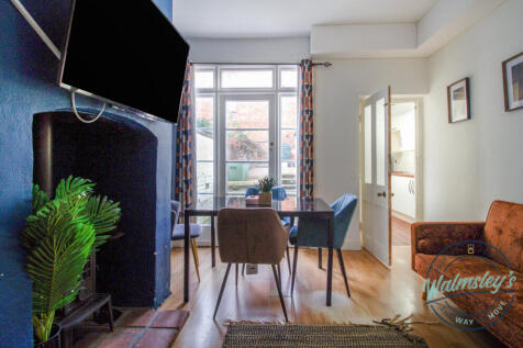 Log burner in rear reception