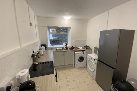 Bright kitchen with modern appliances...