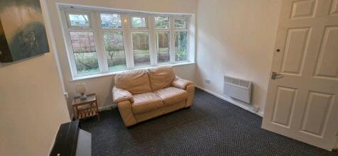 Bright lounge area with large windows...