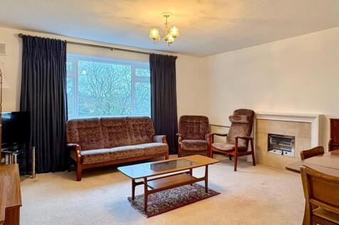 Bright, well-proportioned living room with a la...