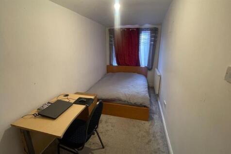 Bright bedroom with dedicated study workspace...