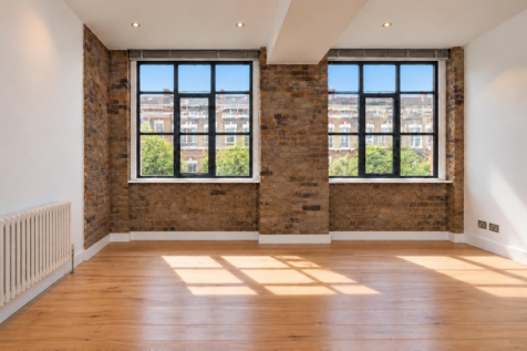 Sunlit Industrial Loft Interior (1).png