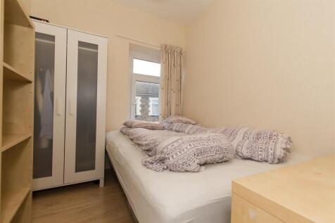 Bright double bedroom with ample storage space...