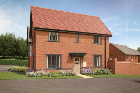 A modern brick house with a red tile roof sits in the foreground