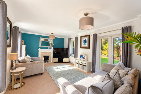 Sunlit Teal-Accented Contemporary Living Room.png