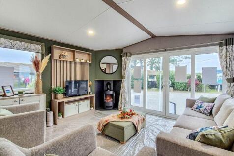 Spacious lounge with feature fireplace
