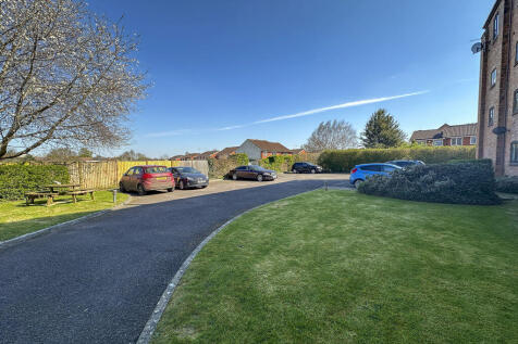 Parking area/communal garden