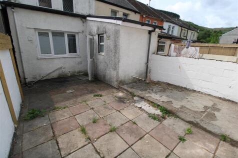 Private paved outdoor space for socialising...