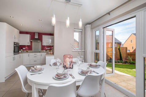 Inside view of the open plan kitchen with dining area. Andover. 3 bedroom home.