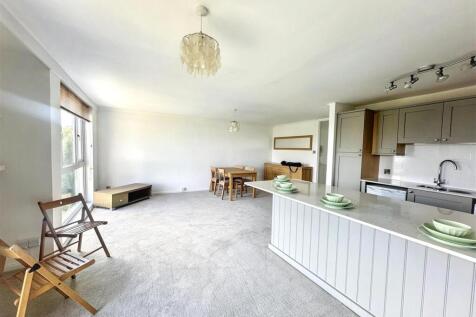 Spacious open-plan living and dining area...