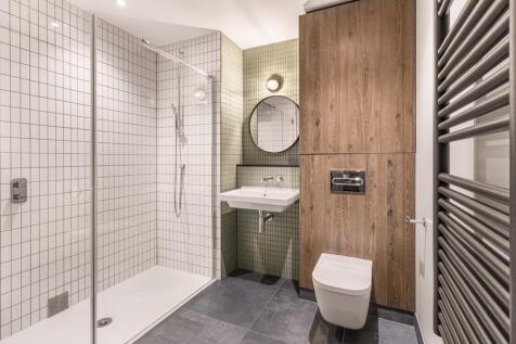 Experience the elegance of this stylish and functional bathroom design.