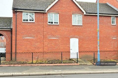 Rear View Of Coach House Building