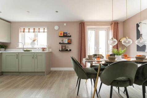 Double doors lead from the dining area to the garden