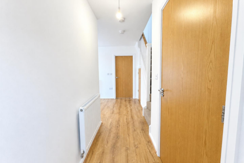 Bright Modern Hallway with Oak Details (1).png