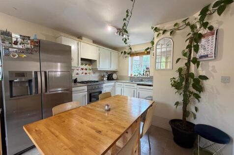 Spacious kitchen with large dining table...