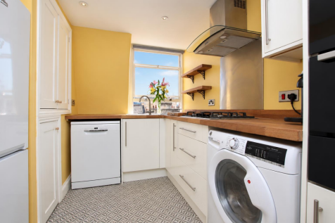 Sunny Yellow Kitchen with Sash Window.png