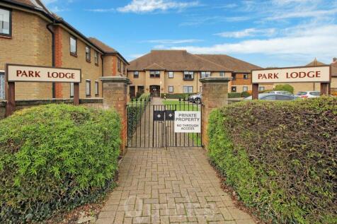 Park Lodge entrance - blue sky.jpg