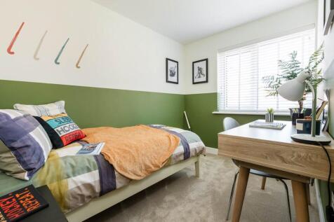 A comfortable extra bedroom offering room for rest, study or imagination