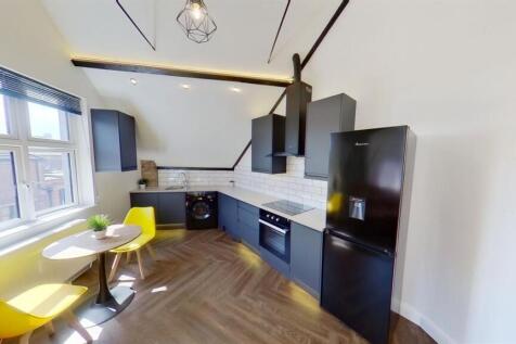 Modern stylish kitchen with bright dining area...