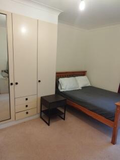 Cosy double bedroom with built-in storage...
