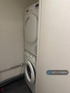 Storage Room With Washing Machine And Dryer