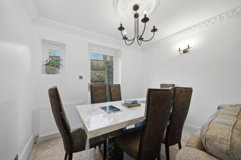 SITTING ROOM AND DINING AREA