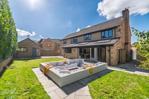 Bi-folding doors connect inside and out