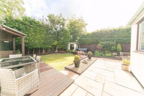 Neatly landscaped private gardens