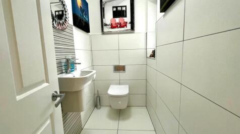 2 PIECE TILED CLOAKROOM