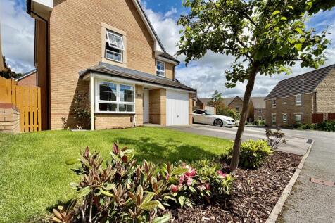 EXTERNAL FRONT AND GARAGE